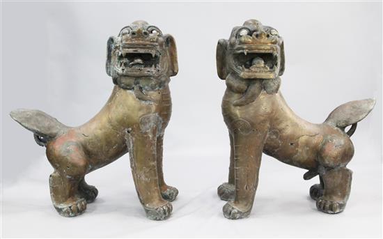 A pair of massive South East Asian patinated copper and composition lion-dogs, 113cm